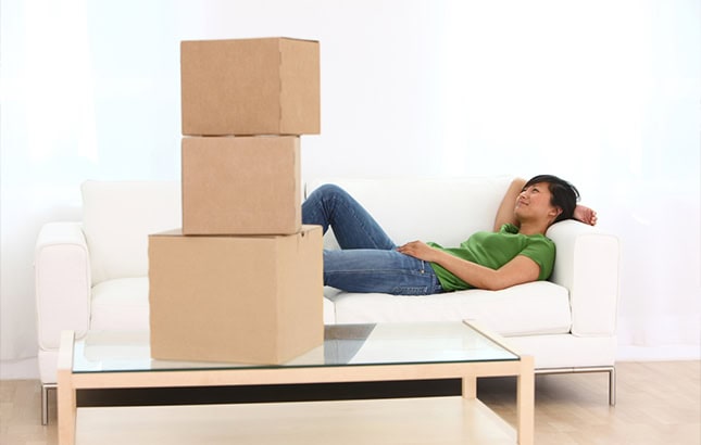 Woman Relaxing During a Move